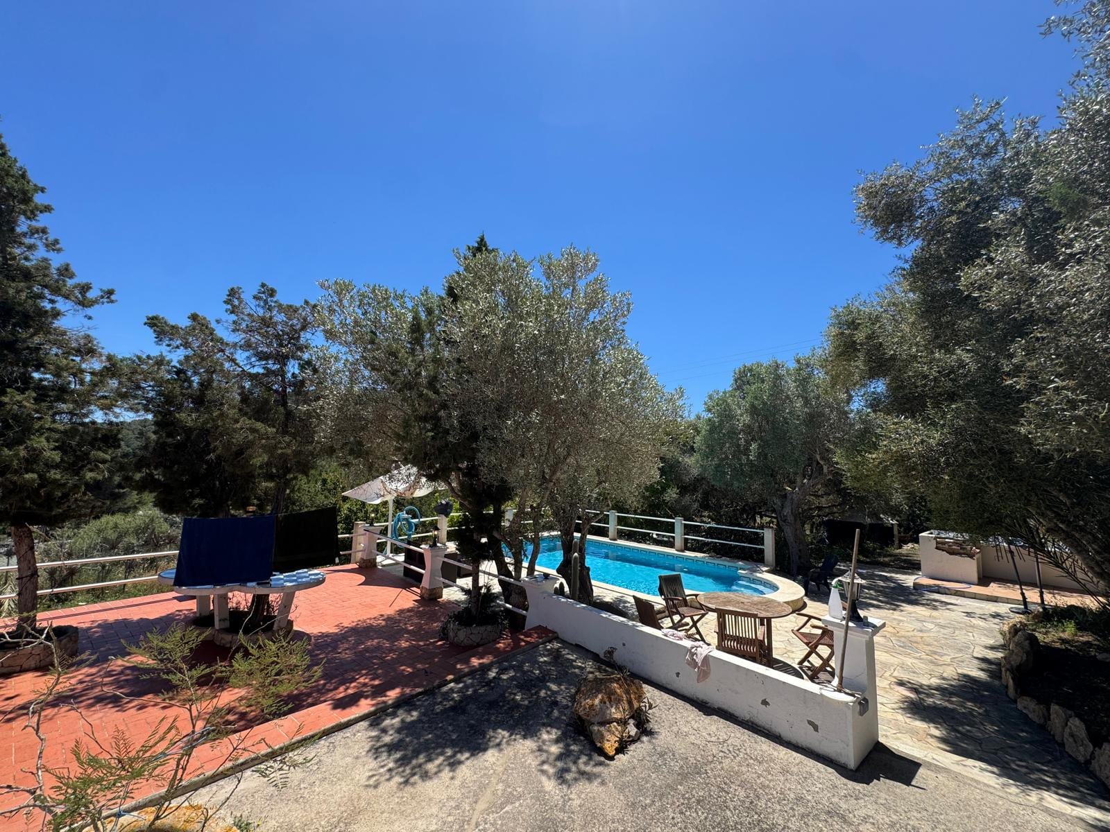 Pool under deep blue Ibiza sky